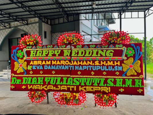 papan bunga pernikahan medan aksel florist